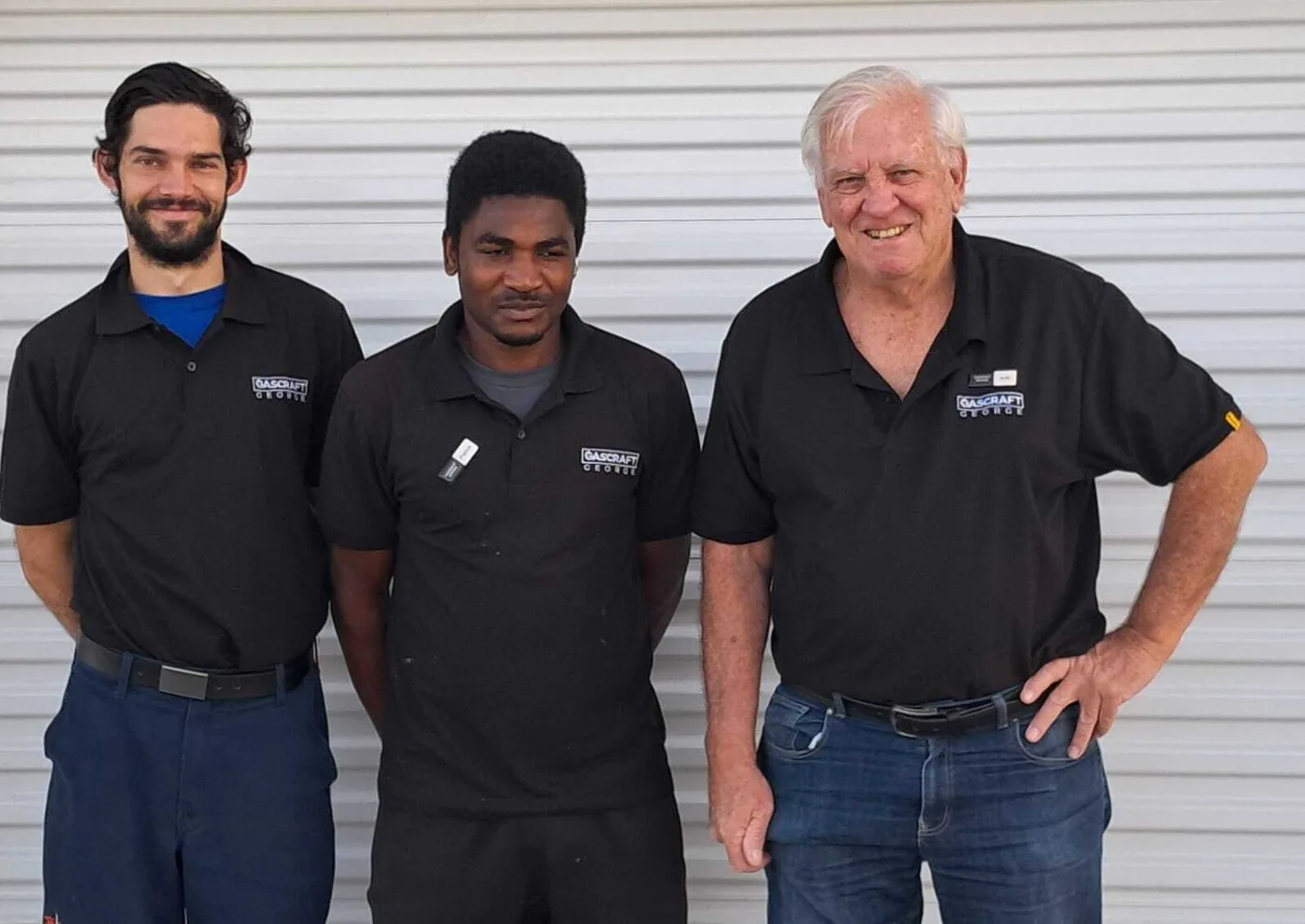 The GasCraft George team, from left to right: Daimyon, Patrick and Alan, in branded GasCraft George shirts at the Pacaltsdorp workshop
