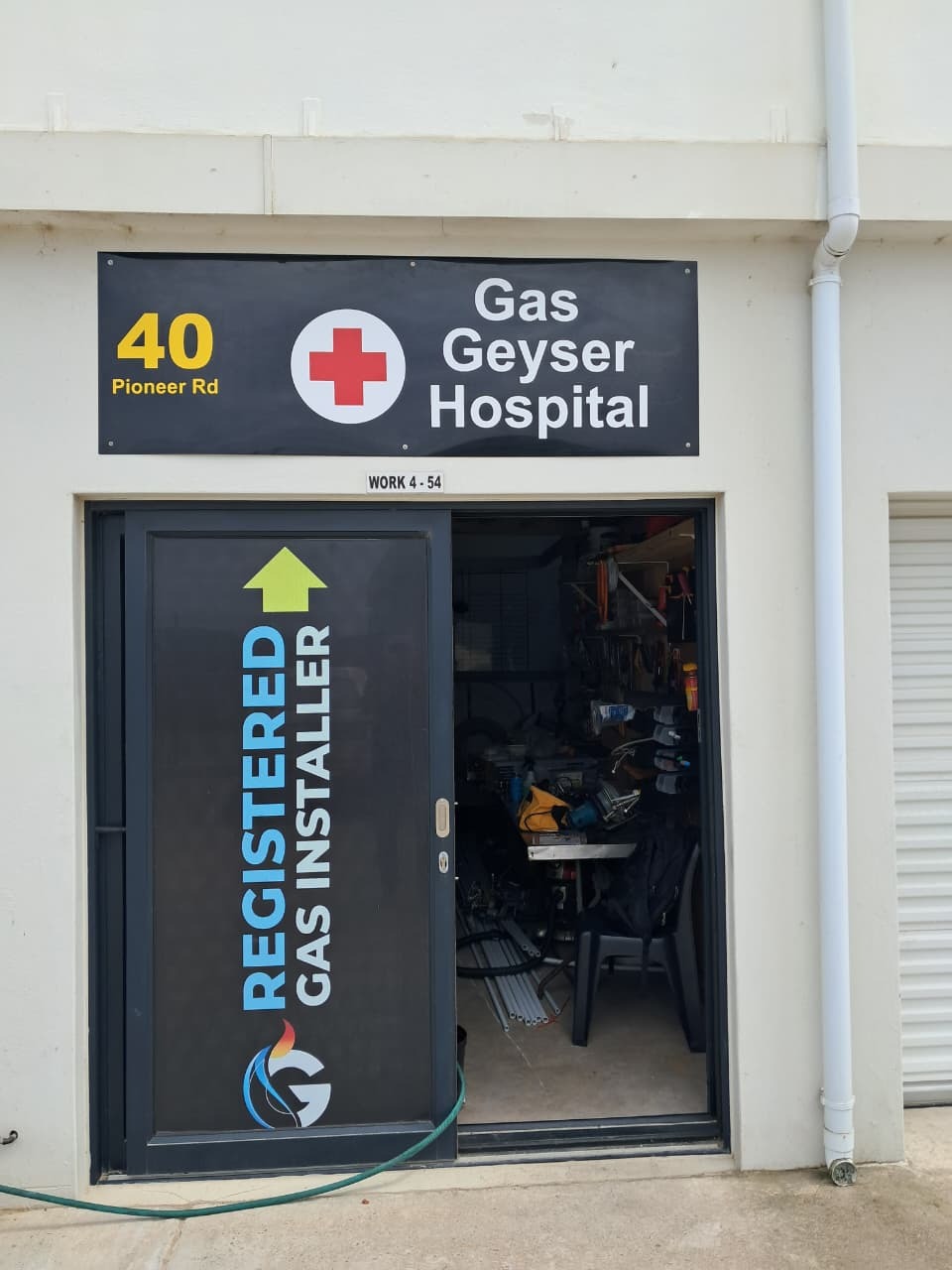 GasCraft George workshop door in Pacaltsdorp, George, with the Gas Geyser Hospital sign and Registered Gas Installer branding